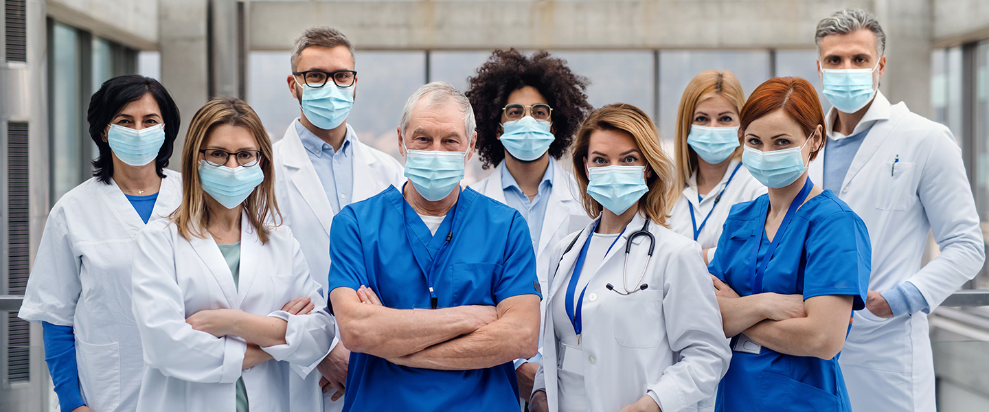 group of hospital workers, doctors, nurses wearing masks